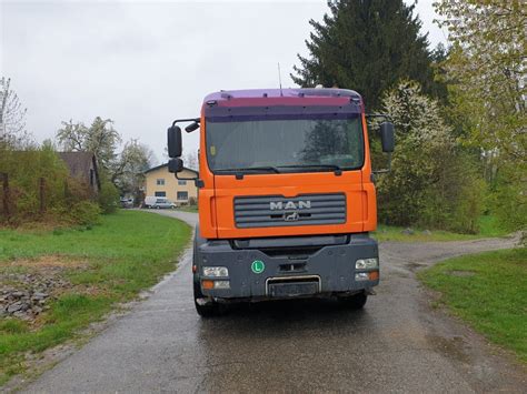 zdjęcie ciągnika siodłowego MAN TGA 410 w trasie