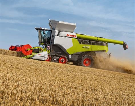 The Claas Consul combine harvester in a field, with focus on the header