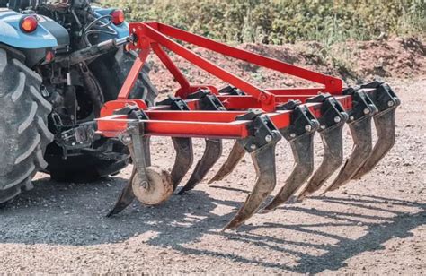 Thematic photo of a subsoiler working in a field