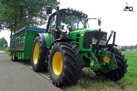 Technical drawing or schematic of John Deere 6330 with key dimensions
