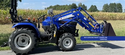 Thematic photo of AGRO-TUR Euroramka front loader working on a farm, loading grain