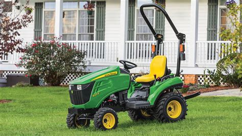 Thematic photo of a garden tractor working in a garden