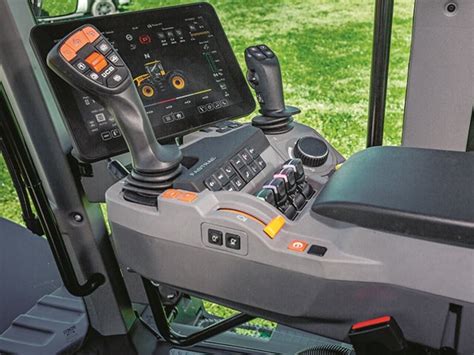 Thematic photo of a JCB joystick and control panel in a cabin