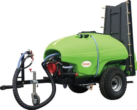 Thematic photo of a 200l orchard sprayer attached to a tractor in an orchard