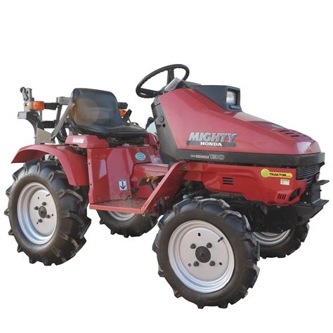 Zdjęcie mini ciągnika Honda Mighty 130 w akcji na polu