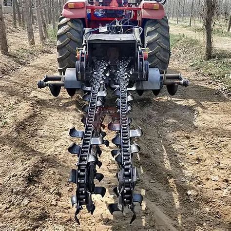 Thematic photo of a chain trencher in action