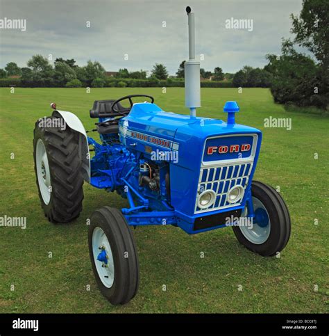 Thematic photo of a blue Ford 3000 tractor working in a field