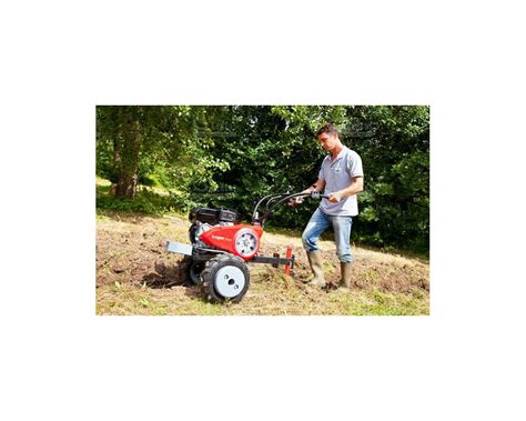 Thematic photo of Pubert Vario 40HC3 rototiller working in a garden