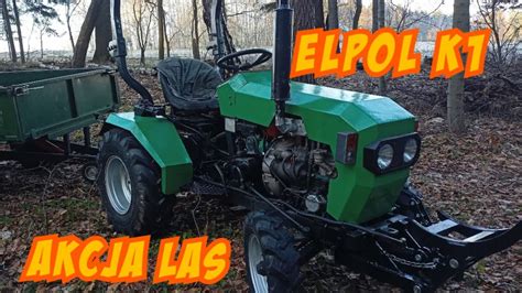 The Elpol K1 minitractor in an agricultural setting