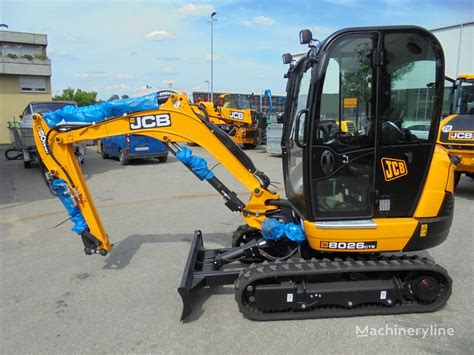 Schemat podwozia minikoparki JCB 8026 CTS z widoczną wieżą obrotową i wspornikami gąsienic