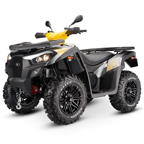 The Kymco MXU 700 ATV in an outdoor setting, highlighting its design and construction elements