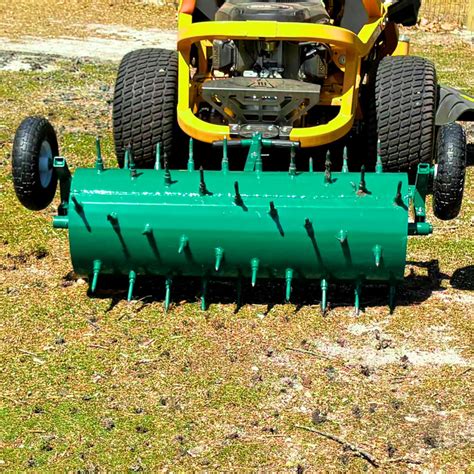 Garden roller with a hitch for a small garden tractor