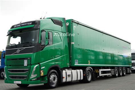 Zdjęcie przedstawiające nowoczesny ciągnik siodłowy Volvo FH w trasie z naczepą