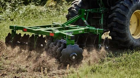 Thematic photo of a disc harrow working in the field