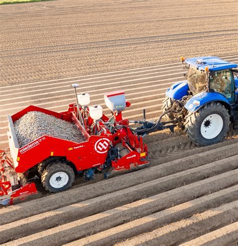 Thematic photo of a potato planter in a field