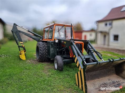 Wizualizacja rozkładu cen koparko-ładowarek Ostrówek na OLX według rocznika