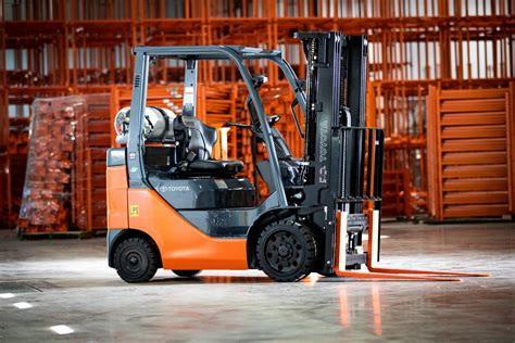 Thematic photo of a Nissan internal combustion forklift operating in a logistics warehouse
