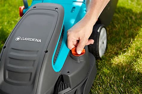Thematic photo of Gardena PowerMax 1400/34 electric lawnmower in action