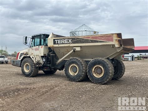 Terex TA30 dumping material on a construction site