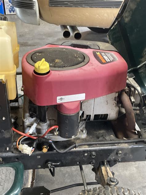 Thematic photo of a Briggs & Stratton engine in a lawn tractor