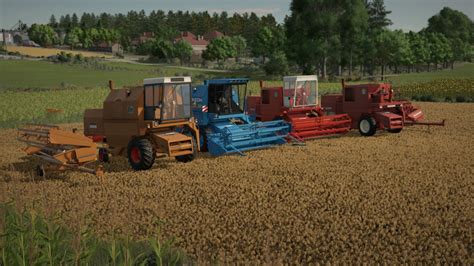 Zestawienie techniczne: porównanie szerokości hedera, średnicy bębna młucącego oraz powierzchni sit w modelach Bizon i New Holland.