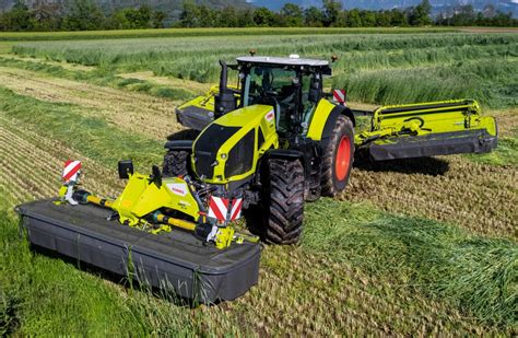 Thematic photo of a Claas front mower in operation on a field