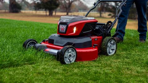 Thematic photo of a Toro electric lawn mower in action on a well-maintained lawn