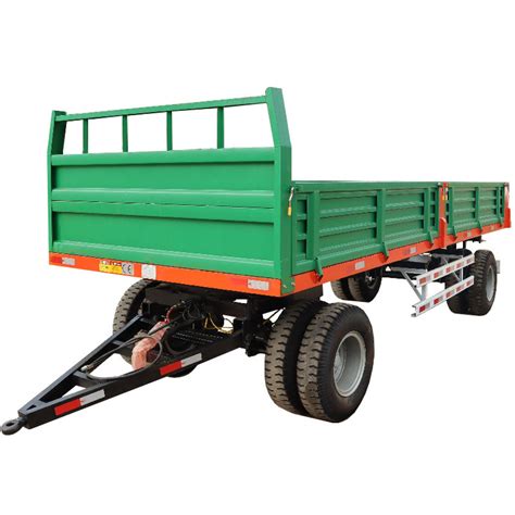 Thematic photo of a new 8t agricultural tipper trailer with 3-way dump in an agricultural setting