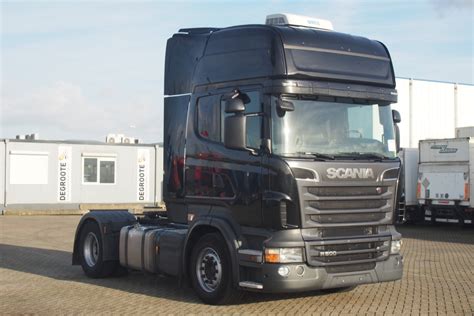 Zdjęcie nowej ciężarówki Scania R500 Topline z malunkami flag Polski i Iranu
