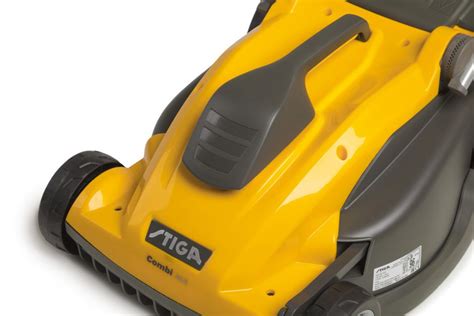 Thematic photo of STIGA Combi 336c electric lawn mower in a small garden