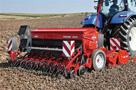 The Kuhn Premia 300 seed drill in action, showing its robust construction and seeding units.