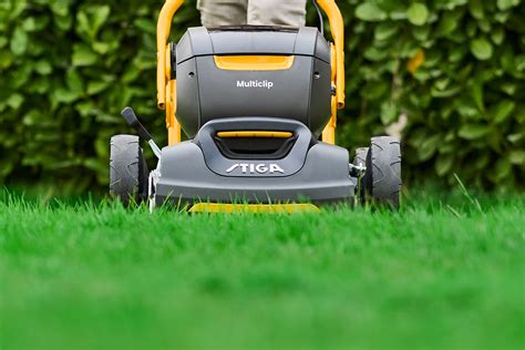 Thematic photo of a Stiga gasoline lawn mower in a garden