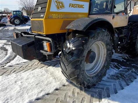 Thematic photo of JCB Fastrac 185 tractor working in a field