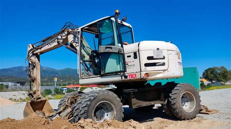 Fotografia koparki kołowej Terex TW110 w akcji