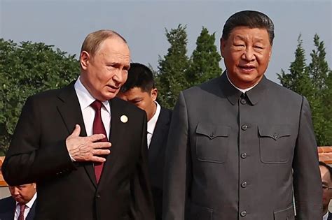 Zdjęcie Xi Jinpinga i Władimira Putina podczas oficjalnego spotkania
