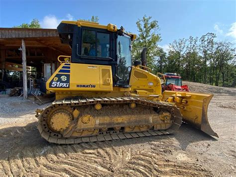 Thematic photo of a Komatsu D51 dozer working on a construction site