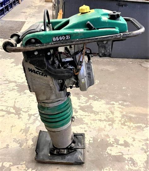 Thematic photo of Wacker BS60 compactor with an emphasis on its tamping foot mechanism