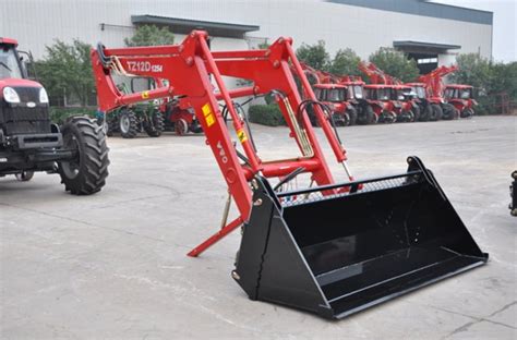 Tractor with front loader and various attachments infographic