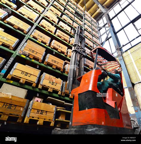 Thematic photo of a forklift operating in a high-bay warehouse