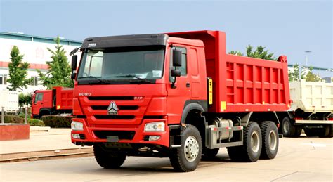 Thematic photo of a MAN 6x4 dump truck operating on a construction site