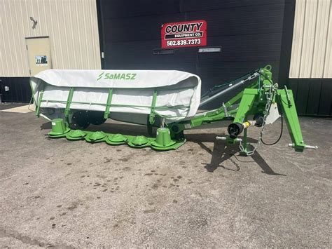 Thematic photo of SaMASZ KDT 260 disc mower working in a field