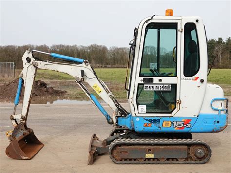 The Ammann Yanmar B15 mini excavator performing work on a construction site