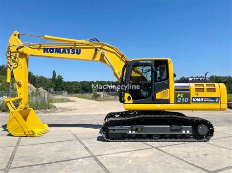 Otwarty podręcznik operatora koparki Komatsu PC210
