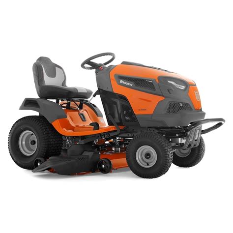 Photo of a Husqvarna lawn tractor working on uneven terrain.