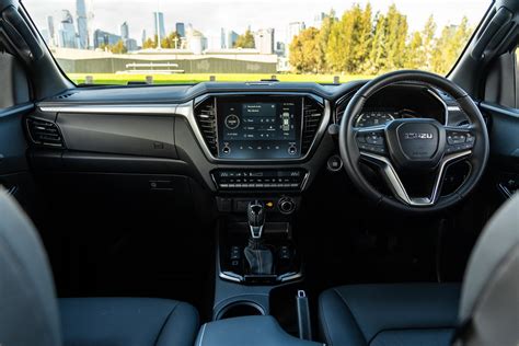 Interior of an Isuzu N35H cabin showing the dashboard and driver's seat