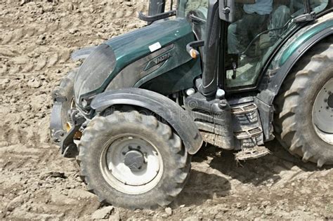 Thematic photo of a Dzik single-axle tractor working in a field