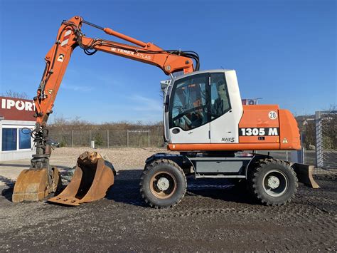 zdjęcie koparki Atlas 1305 w akcji