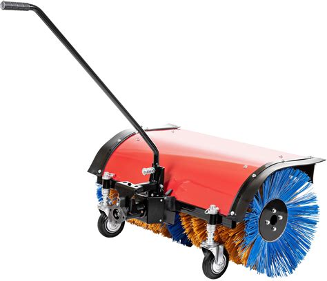 Szczotka do traktora Husqvarna zamontowana z przodu traktora, w akcji zamiatania liści