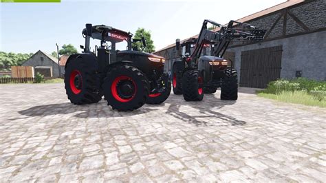Ilustracja ciągnika z podłączonym ładowaczem czołowym w grze Farming Simulator
