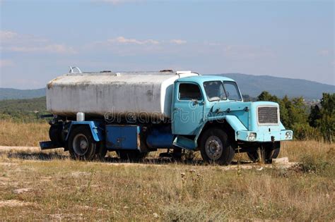 Thematic photo of a tanker truck (beczkowoz) in an urban or rural setting